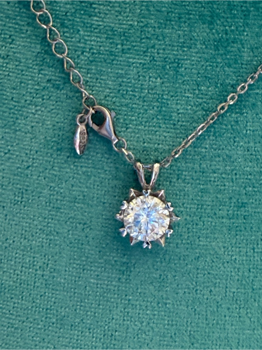 Classic Sterling Silver Pendant Necklace with moisssanite stone.
